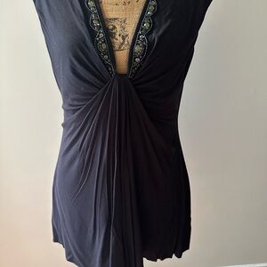 Black Sleeveless Top with Embellished Neckline